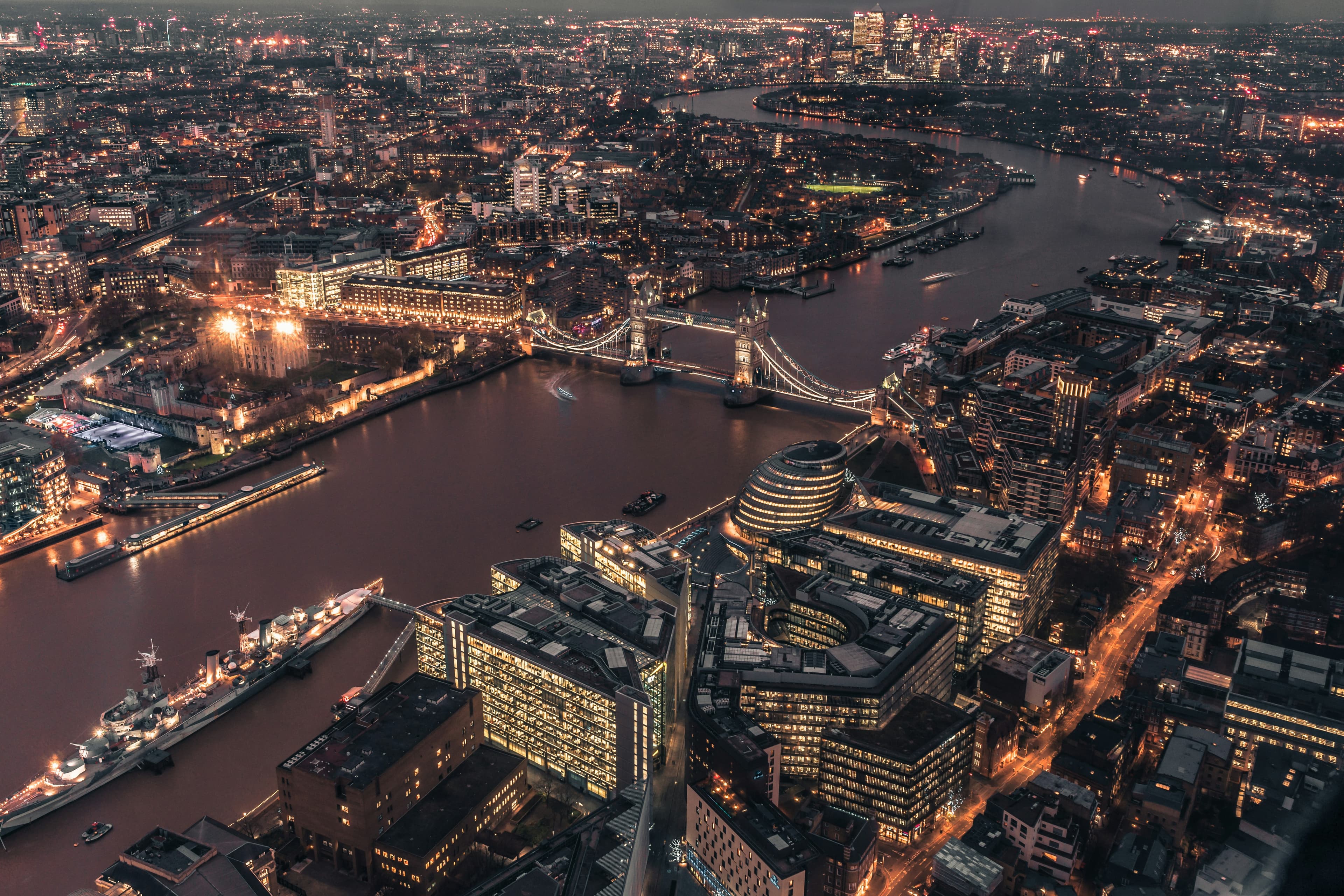 Aerial view of central London at dawn — the living planning record Plott turns into a competitive advantage.